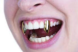 Scarecrow Gold Vampire Fangs